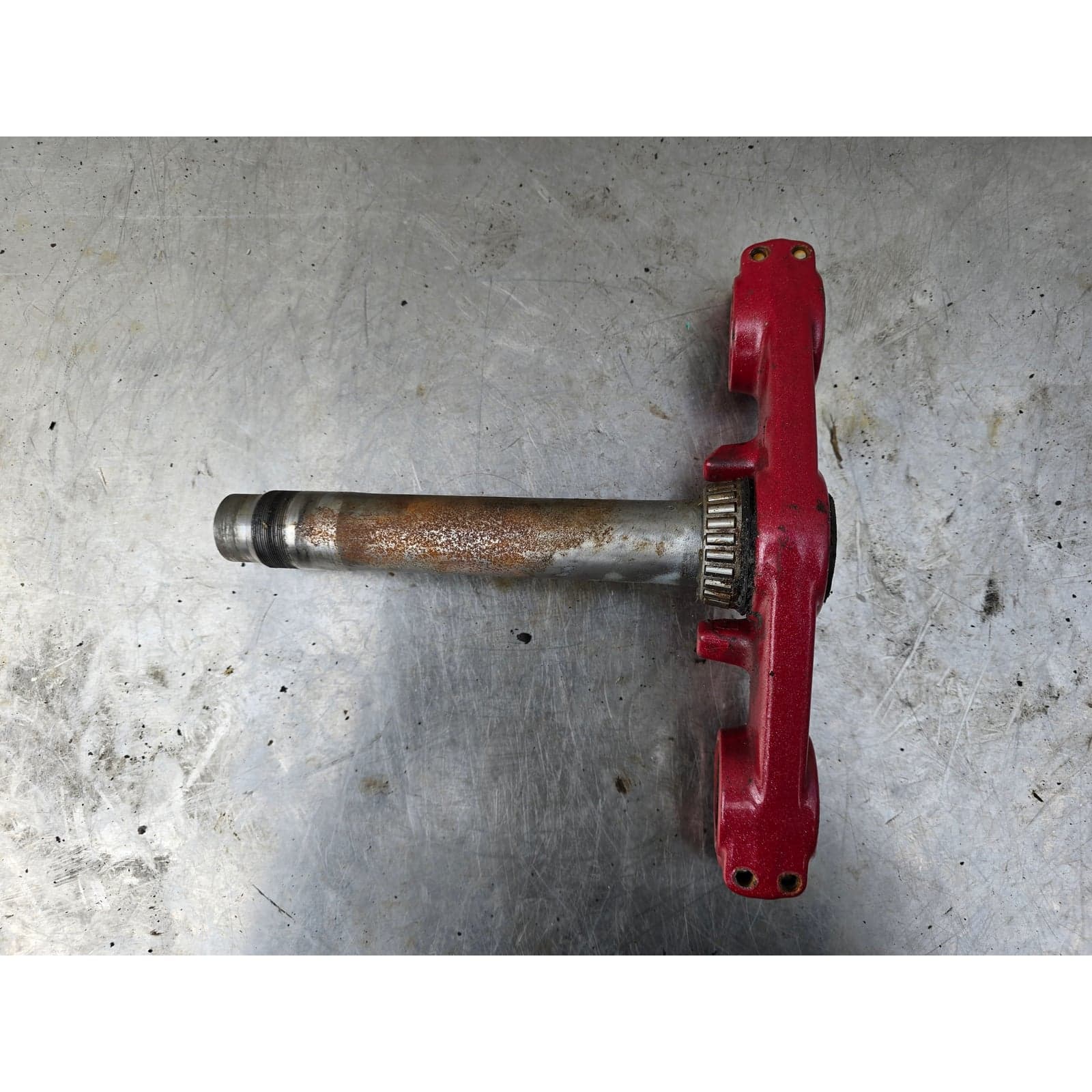 Full side view of the Kawasaki lower triple clamp and steering stem
