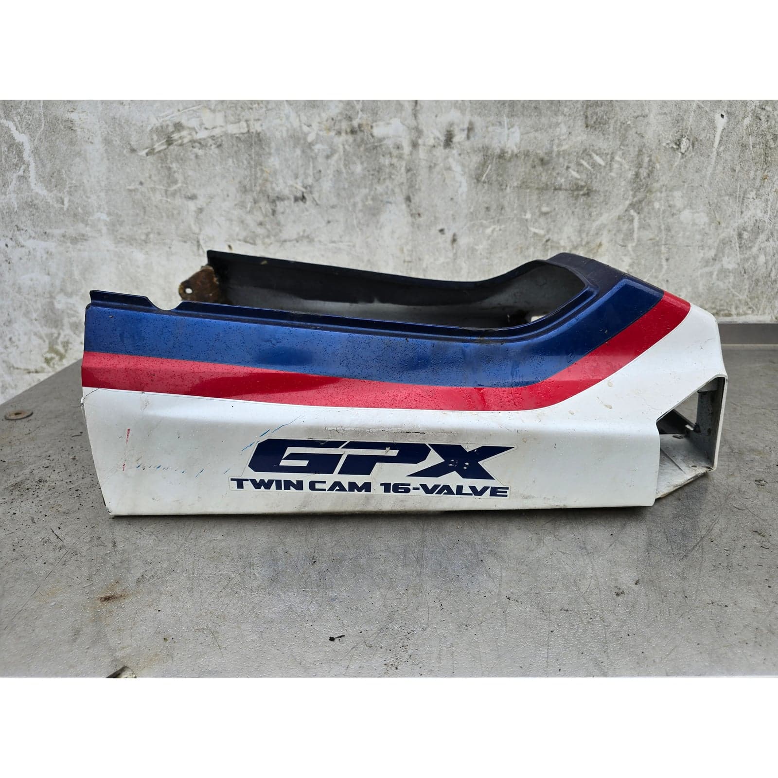 Overall view of the Kawasaki GPX600R left tail fairing panel.