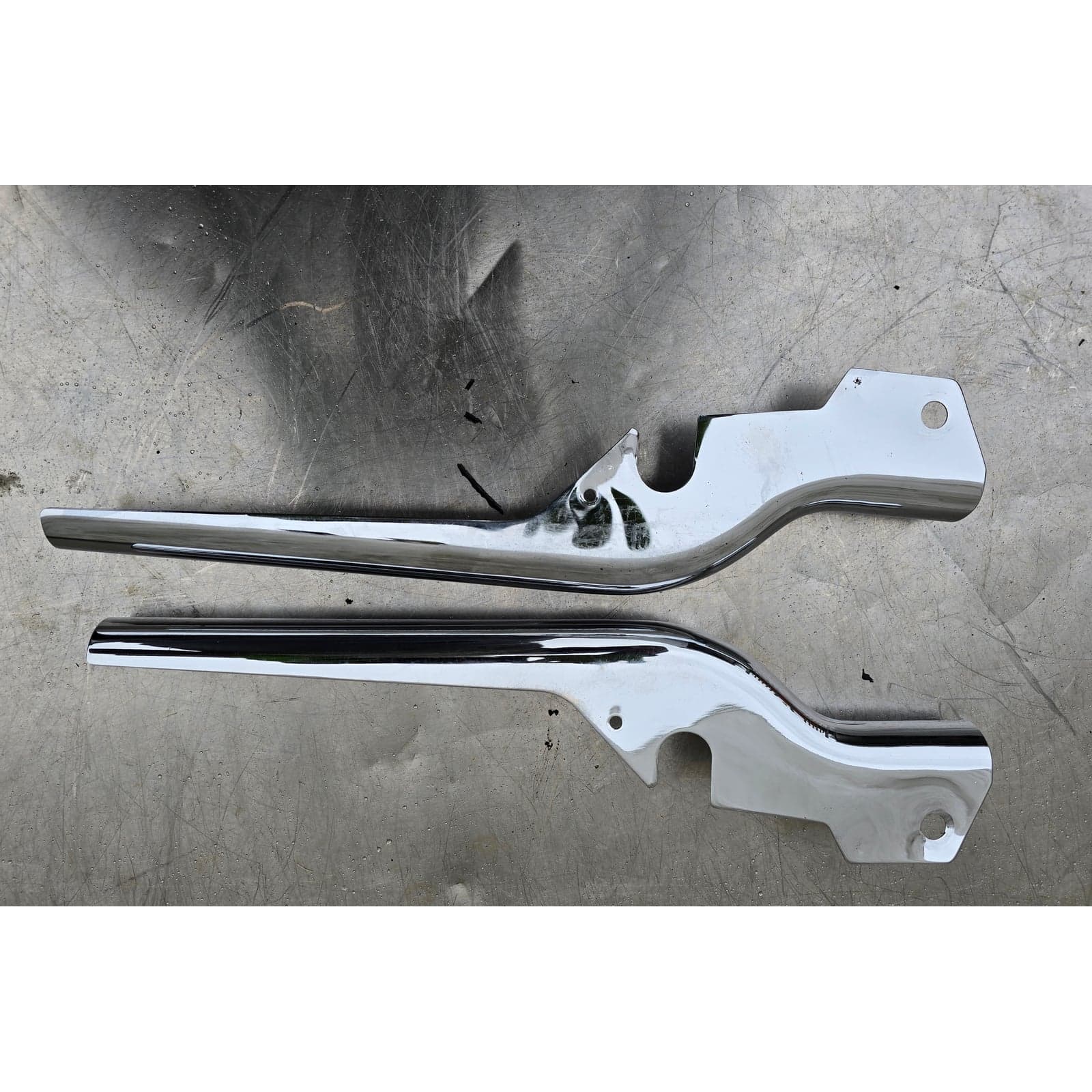 Pair of Harley-Davidson chrome rear fender strut covers.